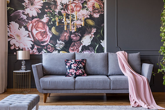 Decorated room and grey couch photo